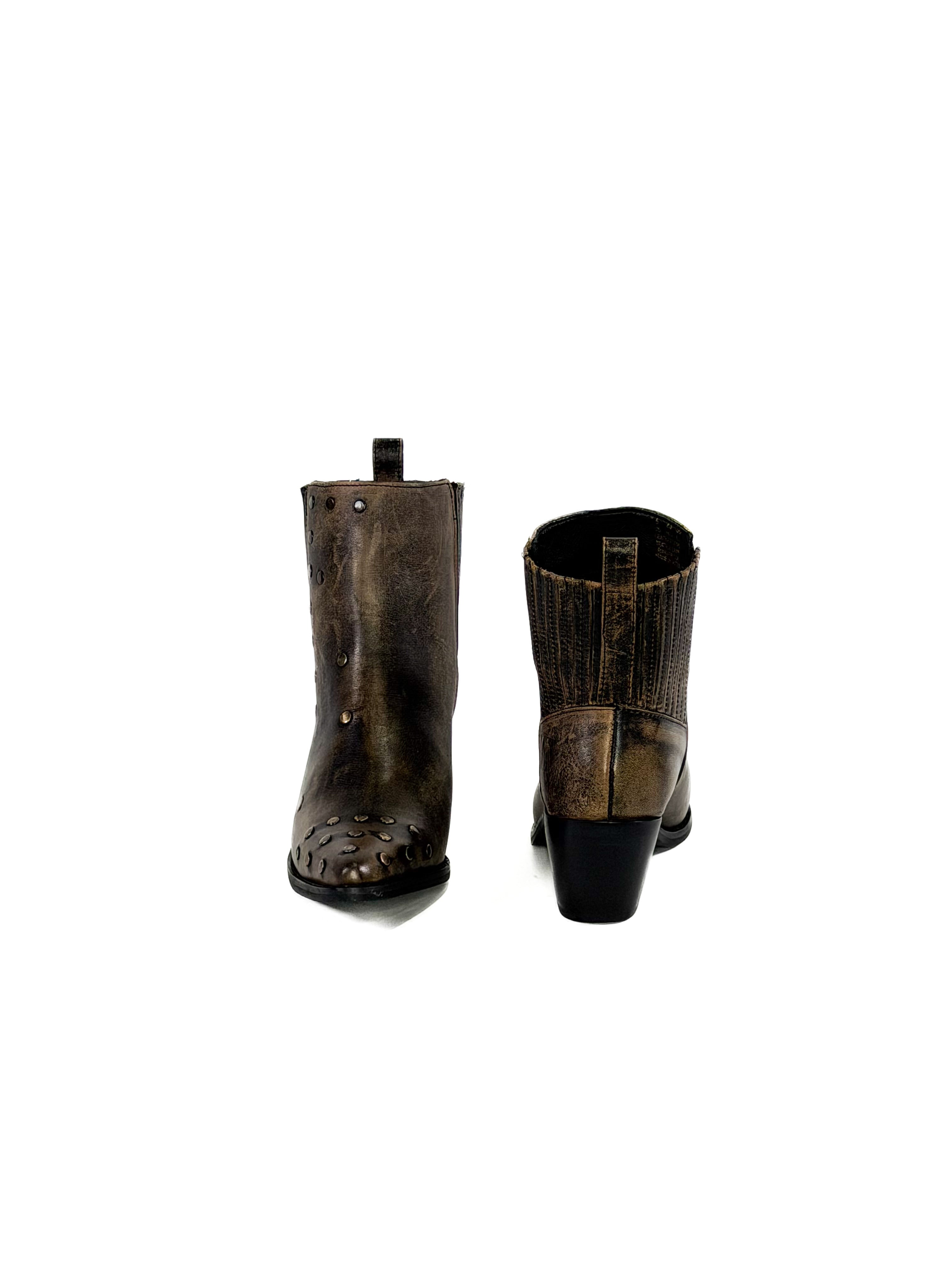 Pair of brown leather boots on a white background