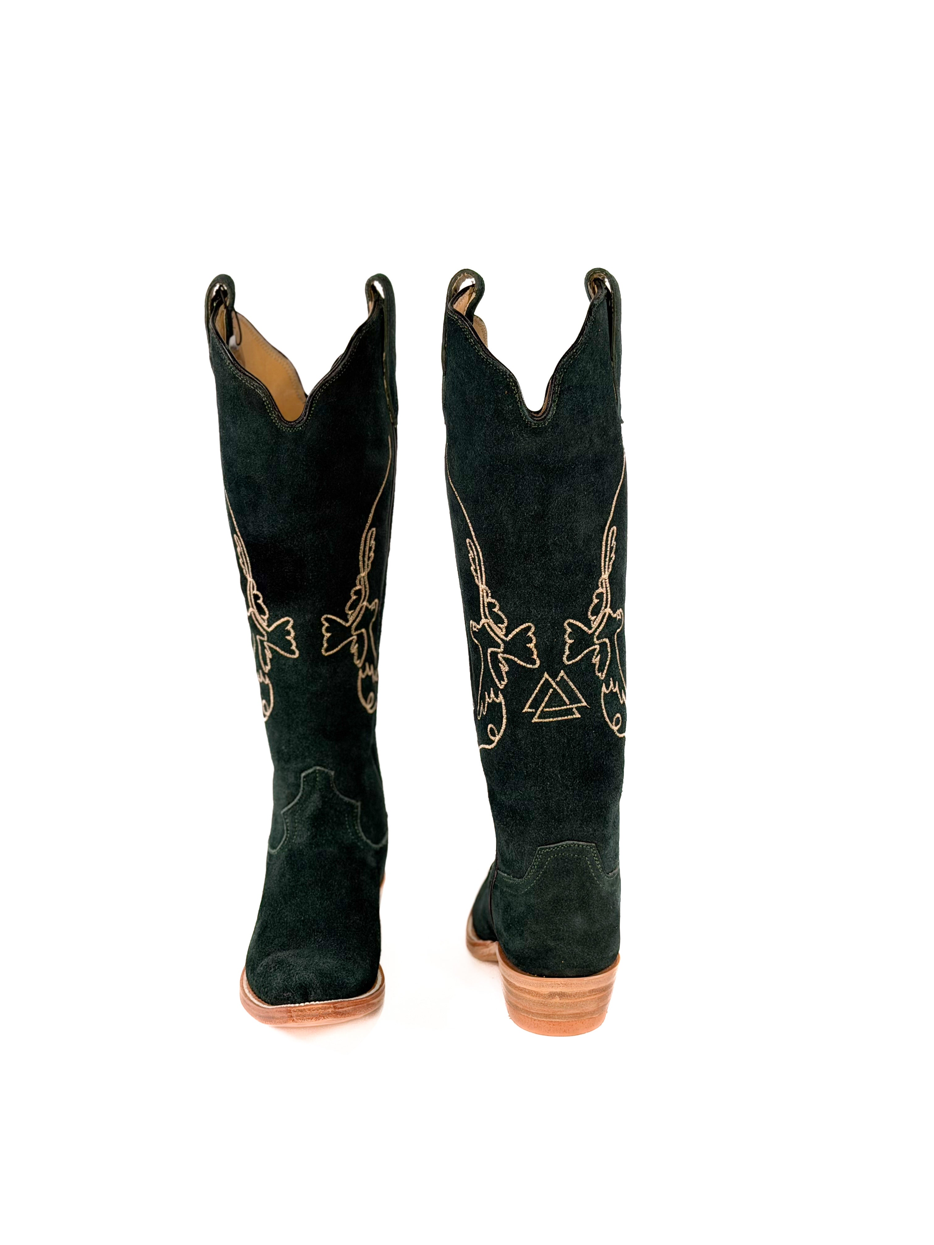pair of green suede cowgirl boots with gold bird detailing