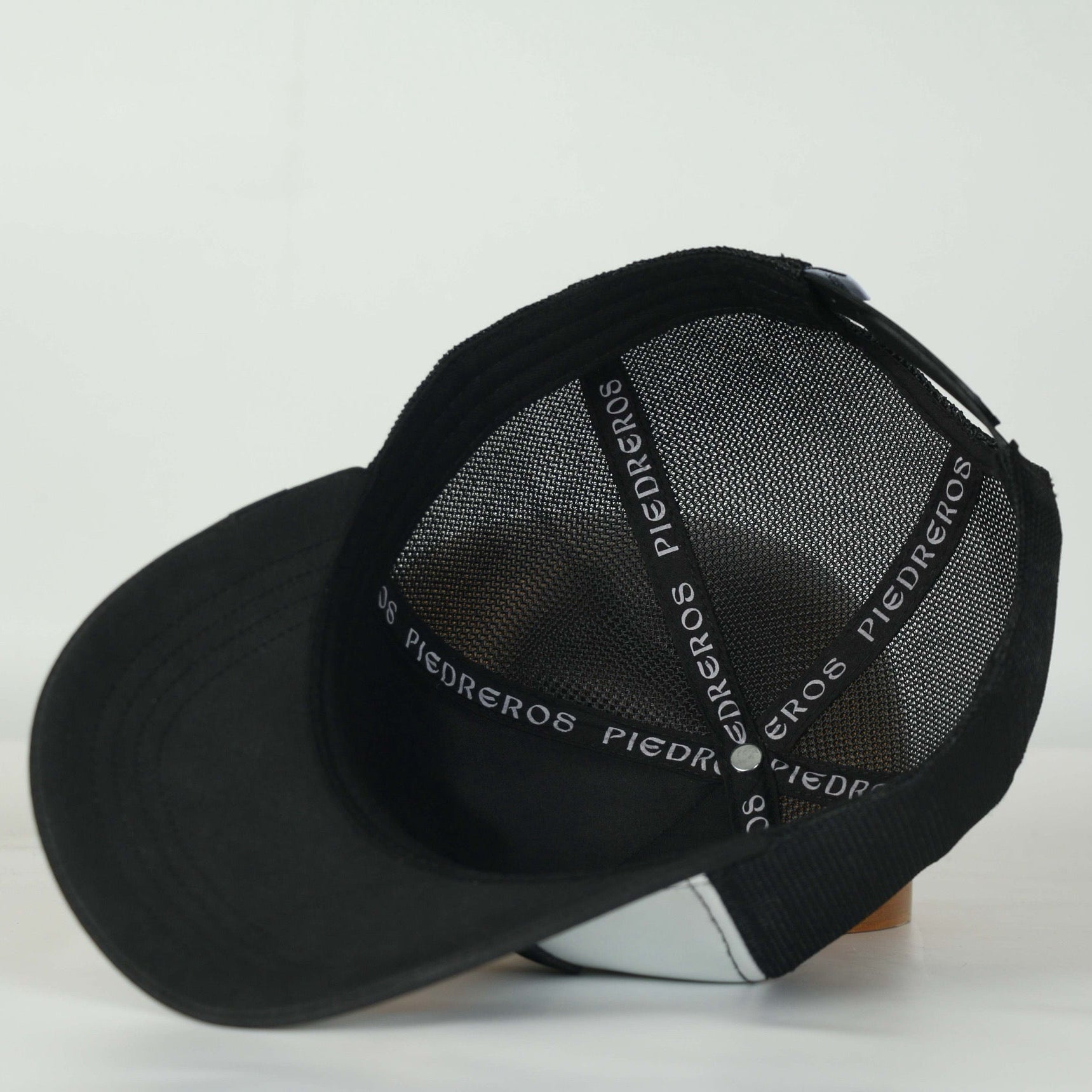 Leather Caps — stitching detail of Cuadra Piedreros cap