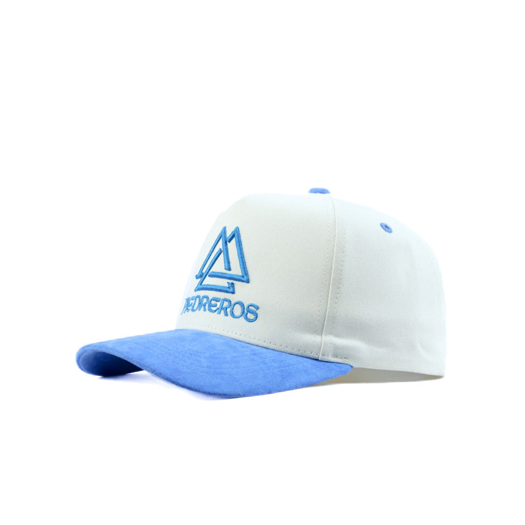 White and blue cap with a logo on a white background