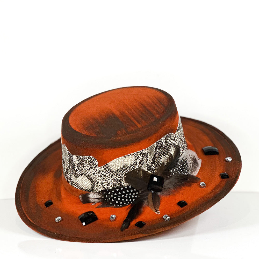 Orange Snake’s Hat — angled view of Cuadra Piedreros cap