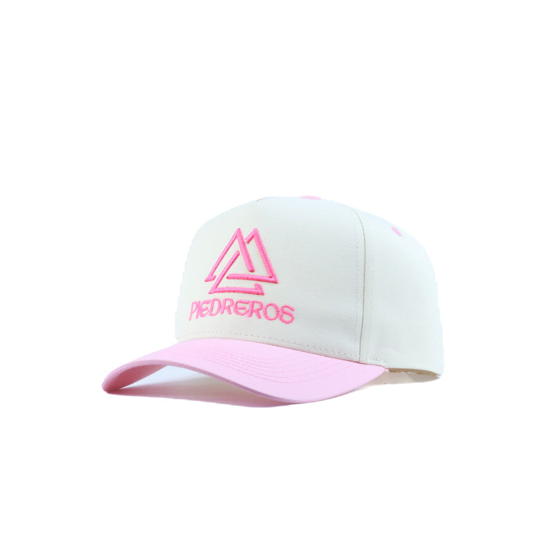 White and pink cap with a logo on a white background