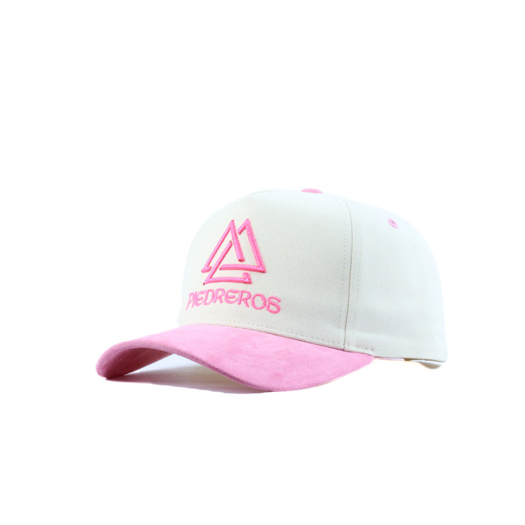 White and pink cap with a logo on a white background