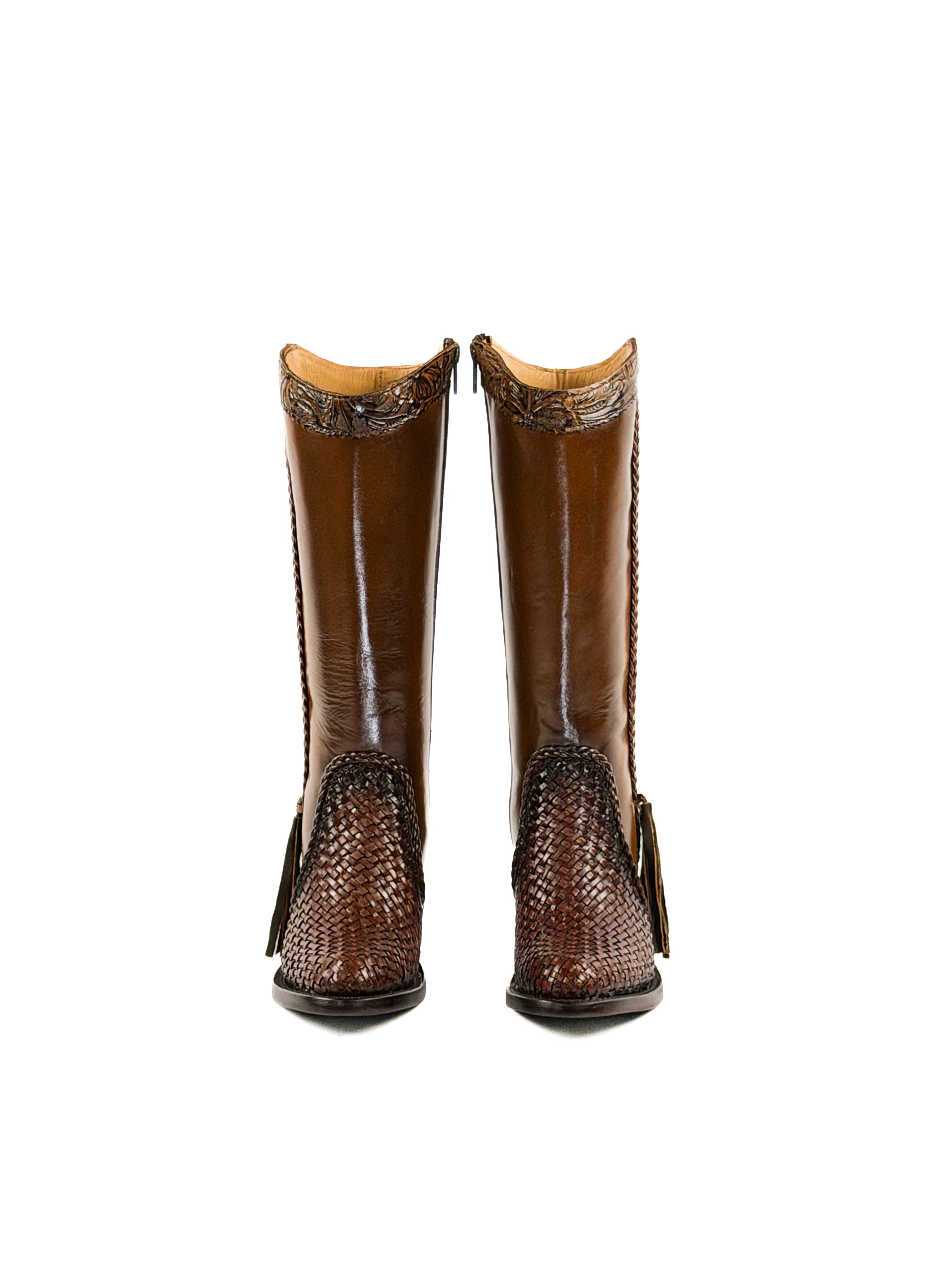 Pair of honey brown womens boots with woven details on the round toe