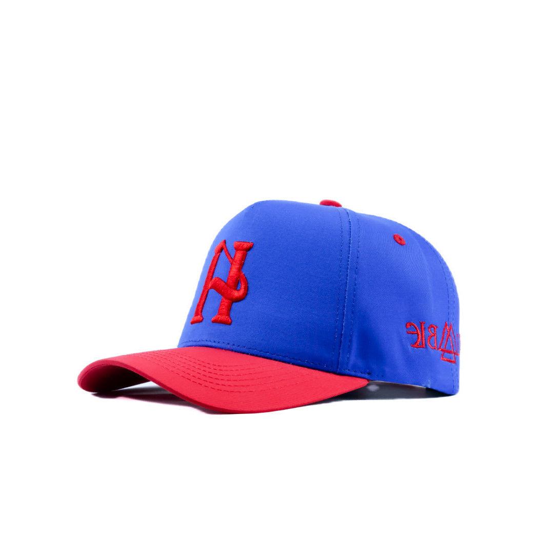 Blue and red baseball cap with logo on a white background