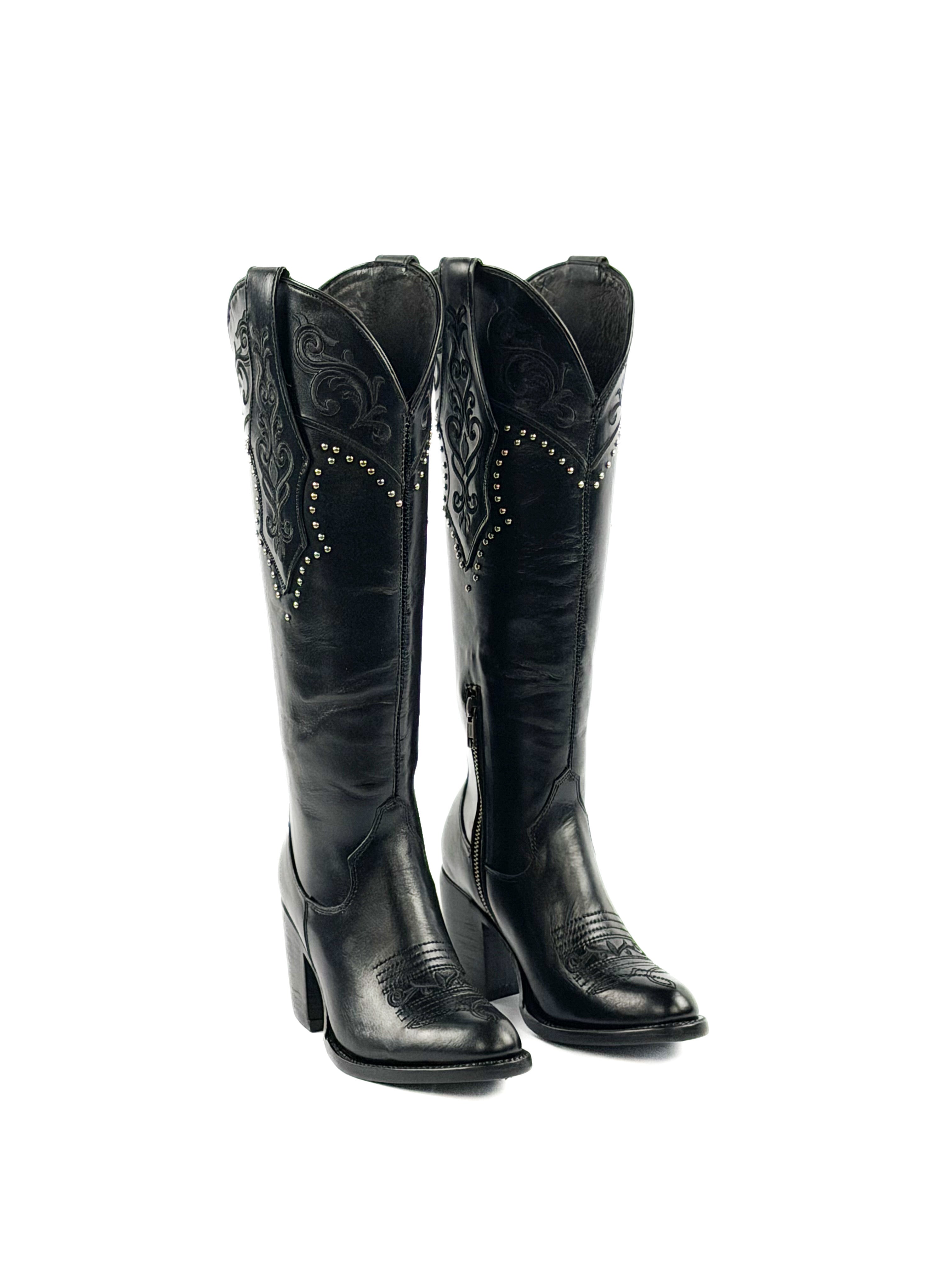 Pair of black round toe boots with studded and design elements on the shaft
