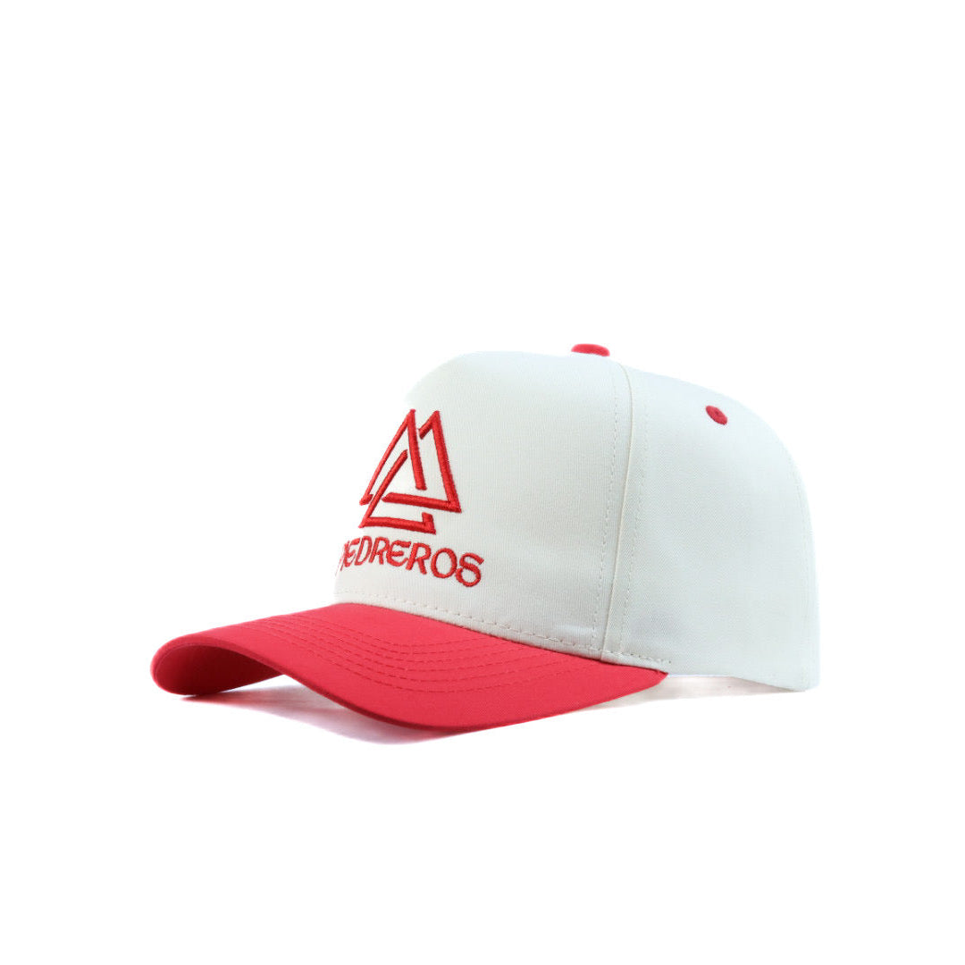White and red cap with a logo on a white background