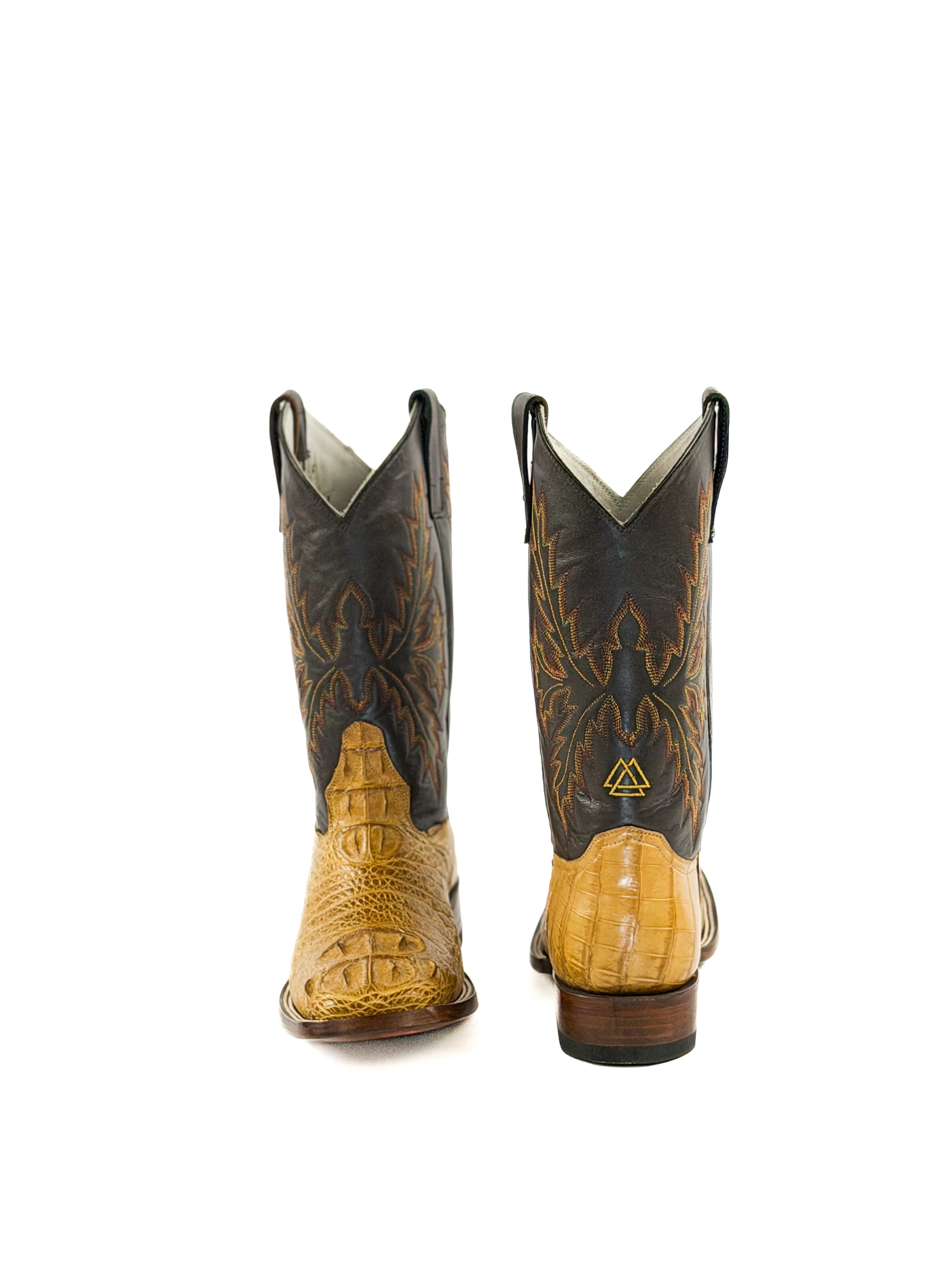 Pair of square toe boots with crocodile mustard yellow skin pattern with a brown boot shaft