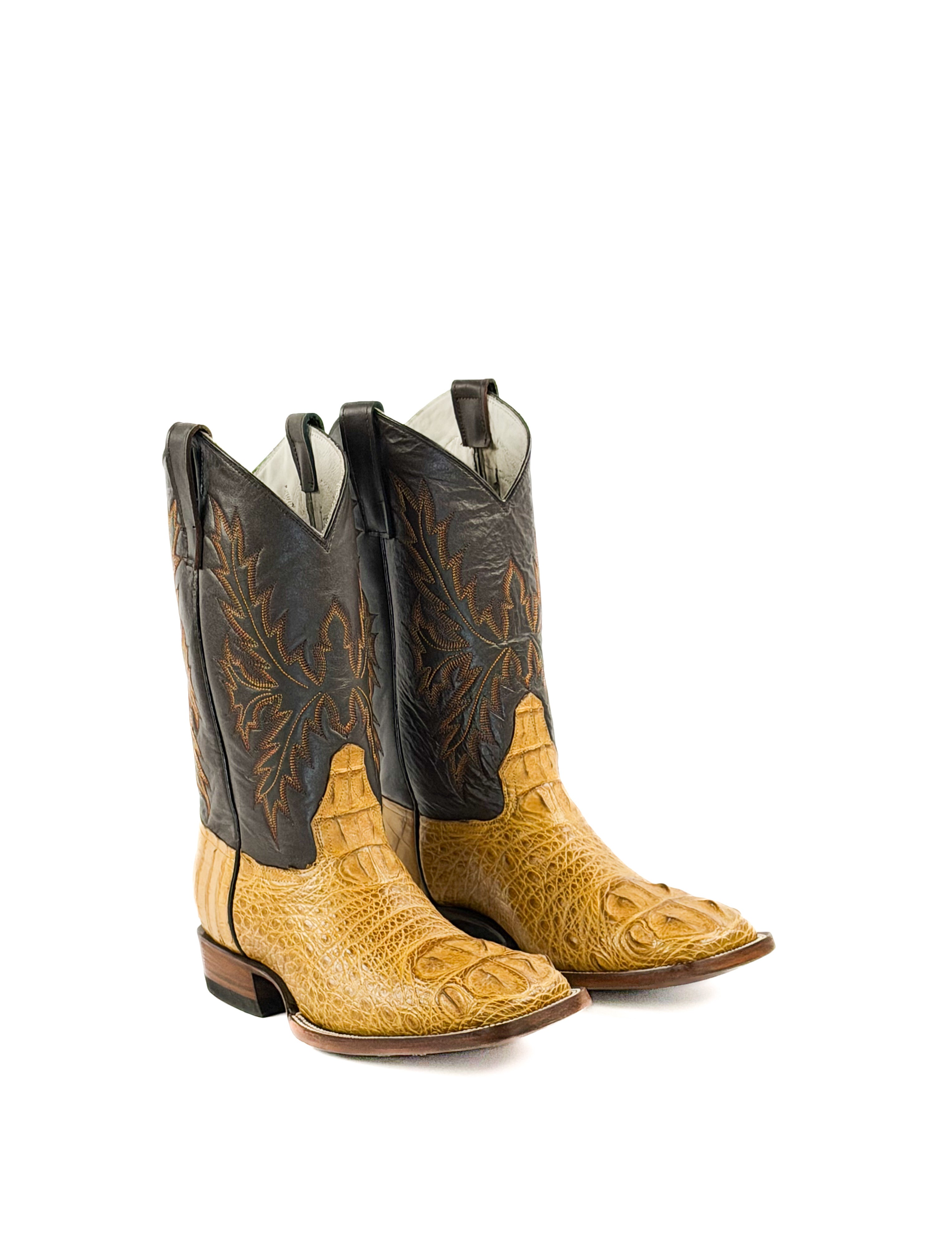 Pair of square toe boots with brown and black design on a white background