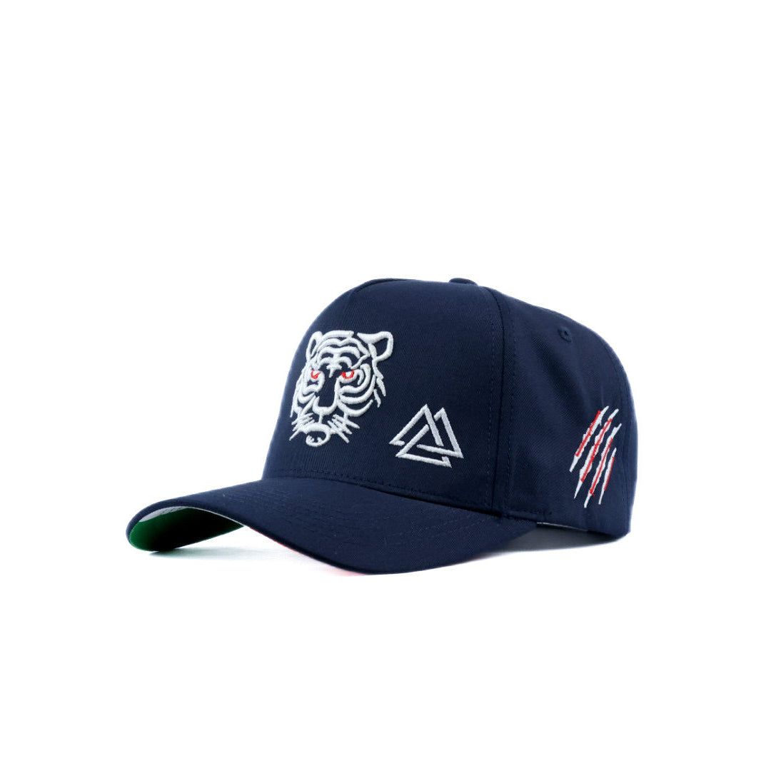 Navy blue cap with tiger and piedreros logo