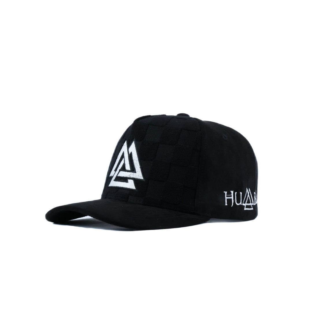 Black checkered cap with white and black logo