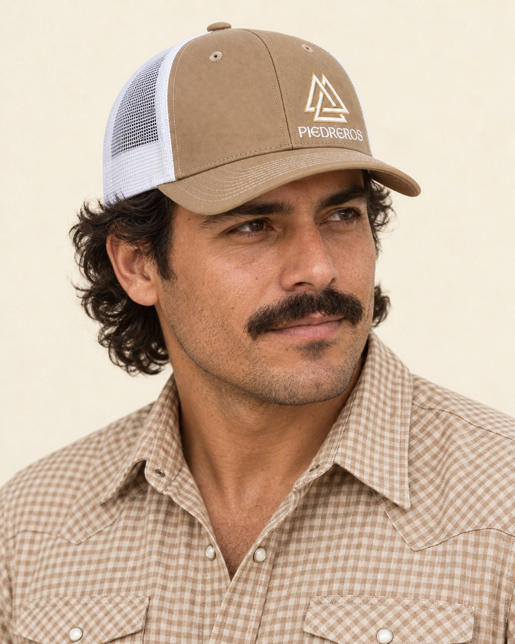 Piedreros 815 Cap Caliche — worn with a check western shirt