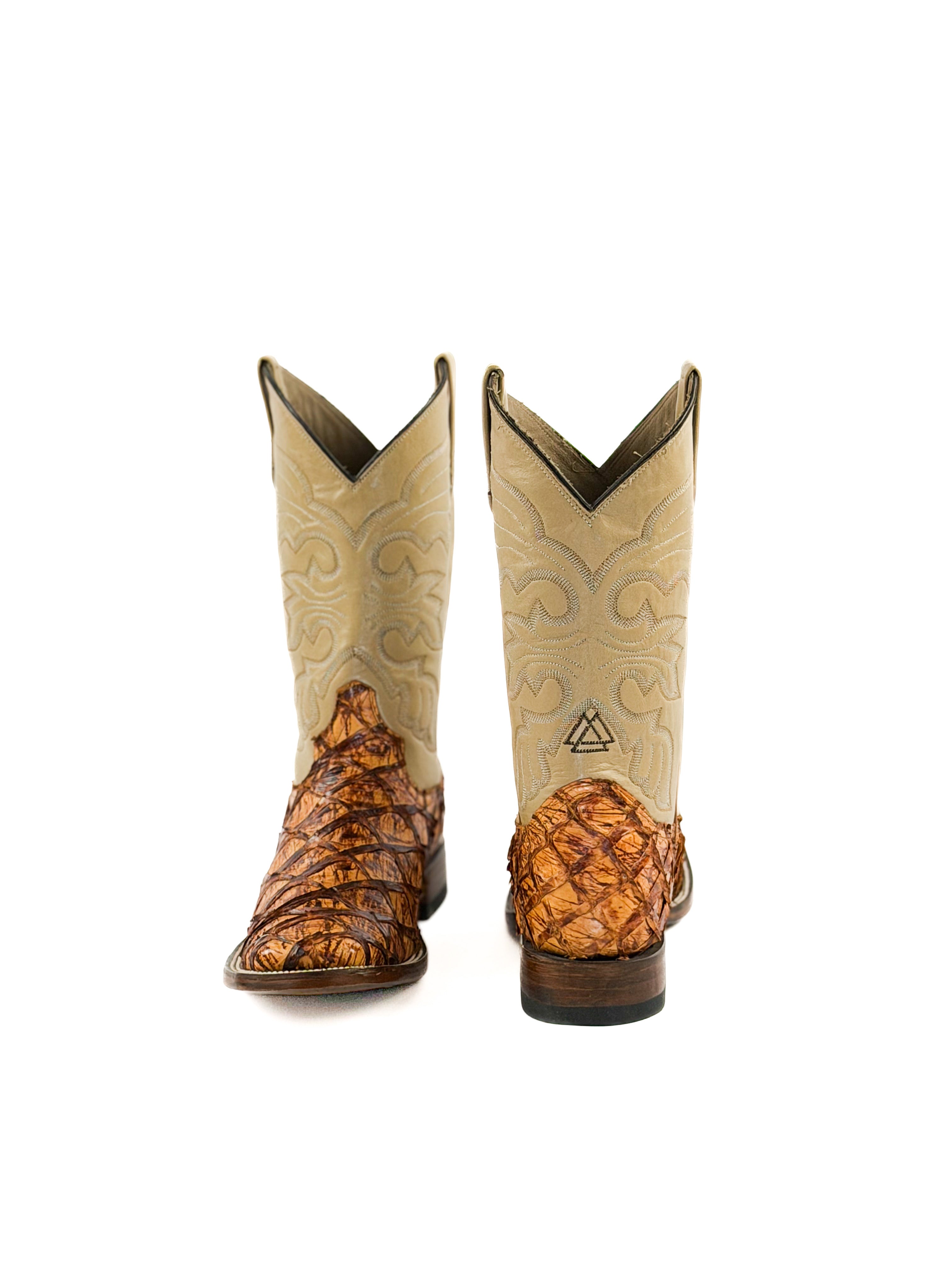 Pair of orange and brown square toe boots with a beige stitched upper shaft