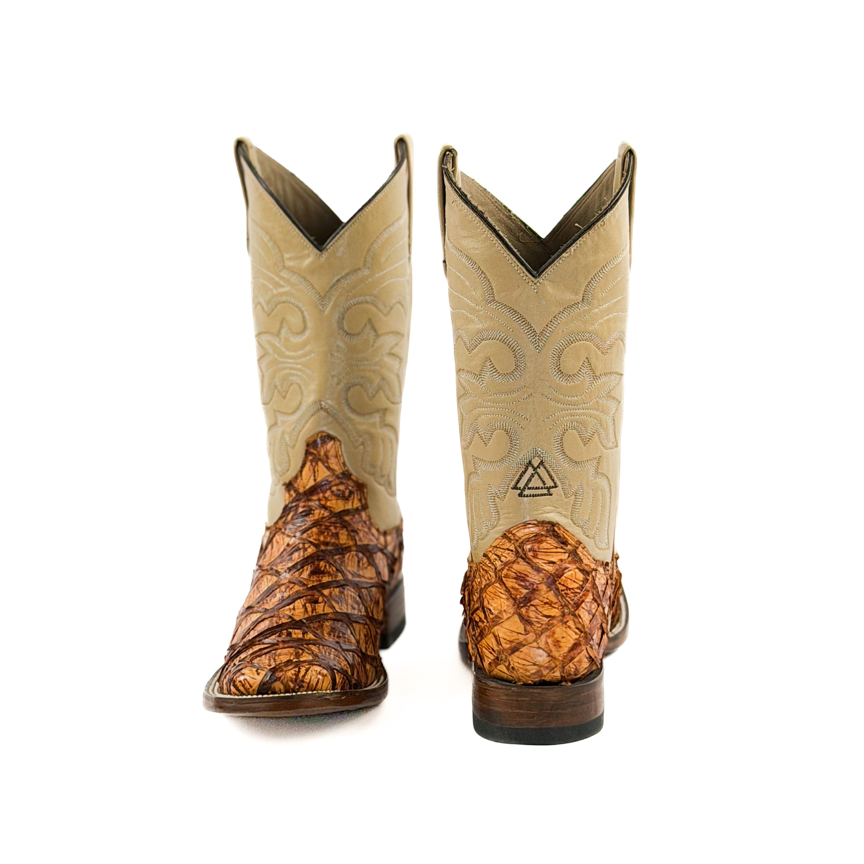 Pair of orange and brown square toe boots with a beige stitched upper shaft