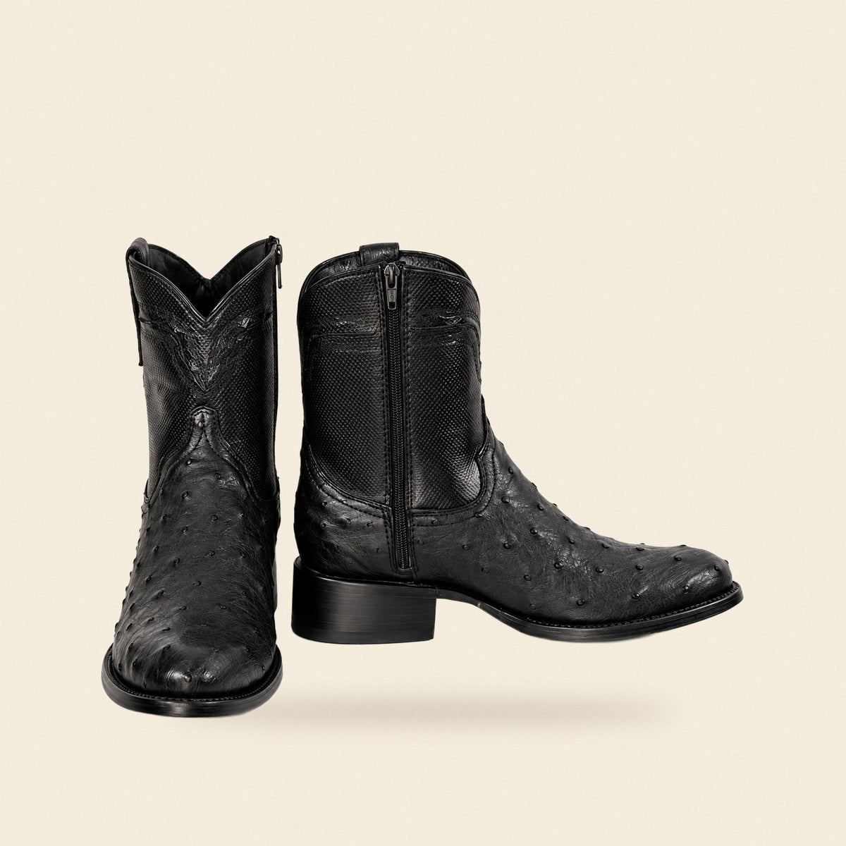 The Detmold — Ostrich Round Toe Men's Cowboy Boot, front and side view