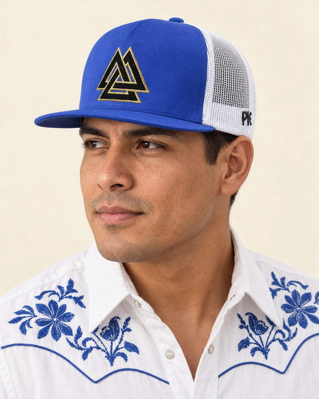Triangulo De Oro Cap Azul Fino — worn with an embroidered white western shirt
