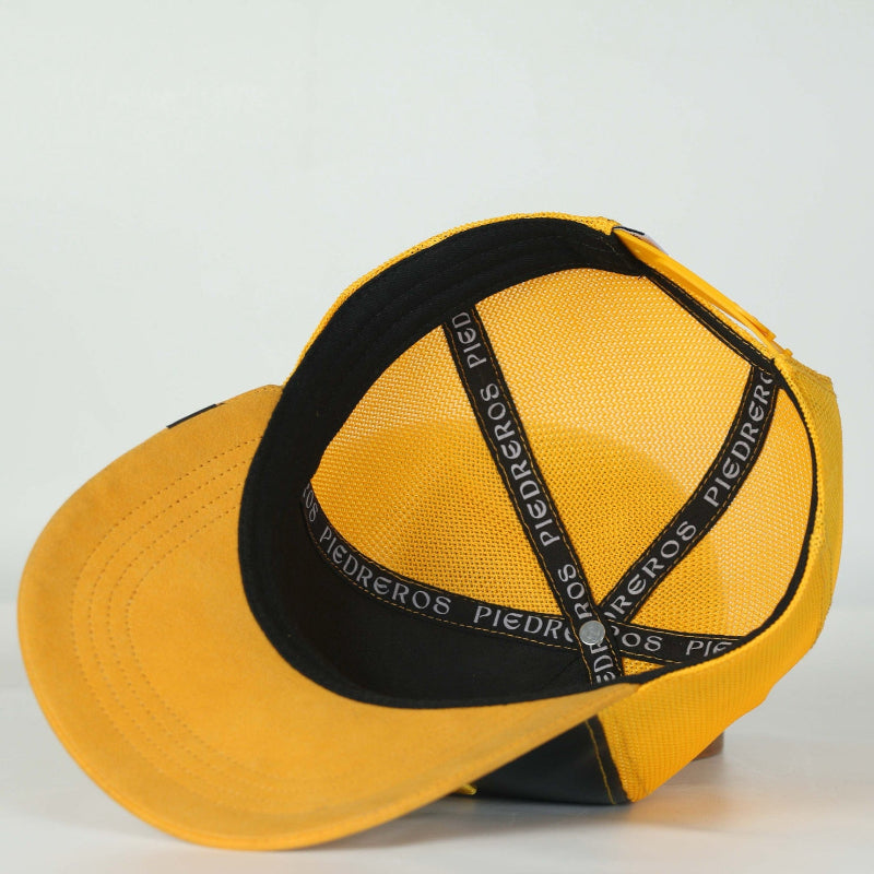 Leather Caps — side view of Cuadra Piedreros cap