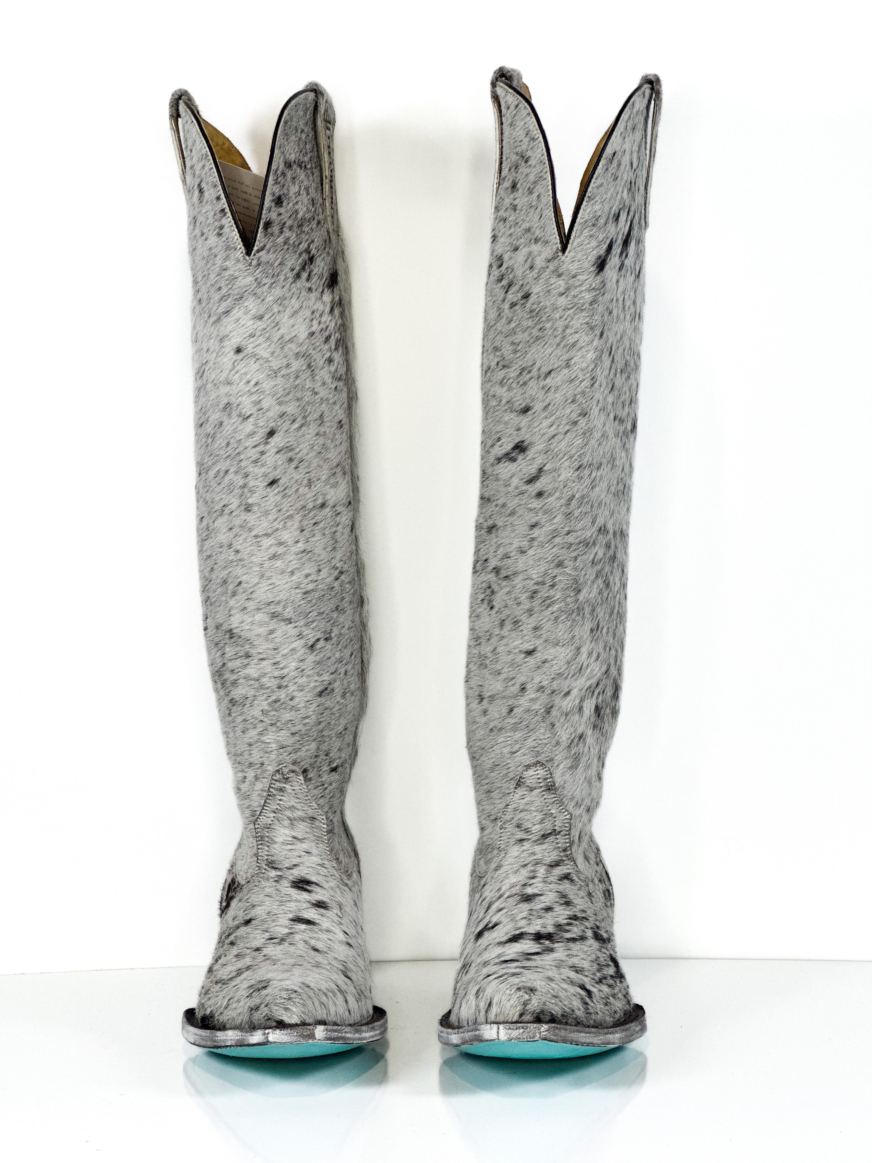 Azeri Cowhide Boot — lifestyle shot of handmade western boots