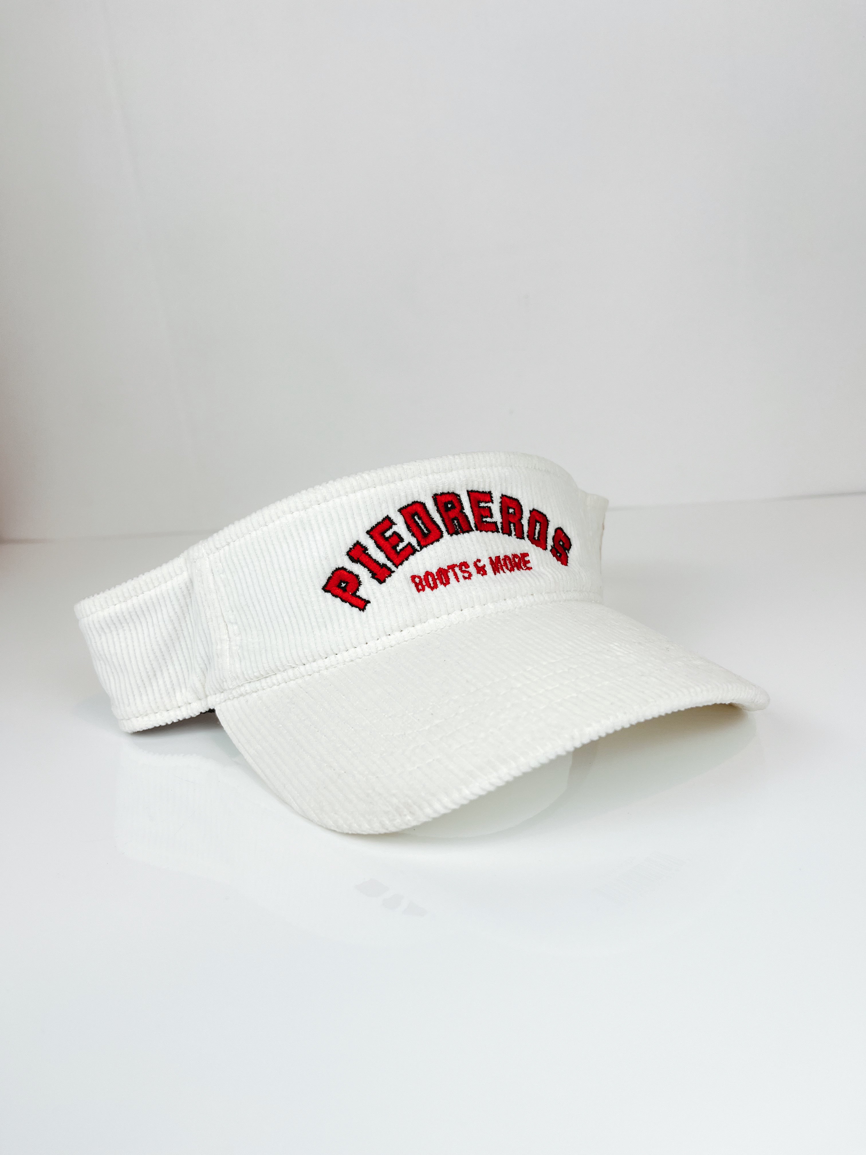 R&B WHITE VISOR LOGO HAT — side view of Cuadra Piedreros cap