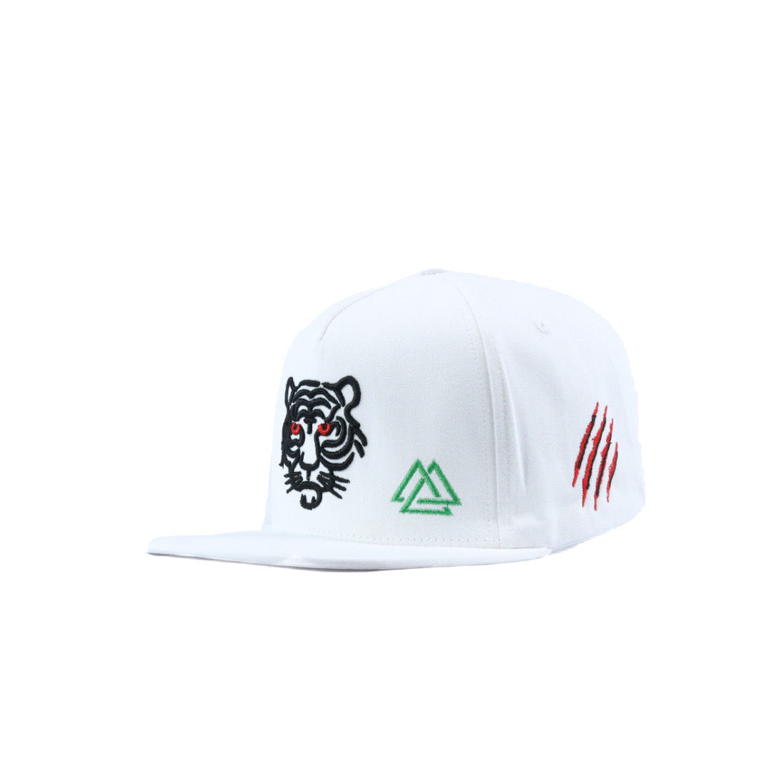 White cap with tiger and piedreros logo