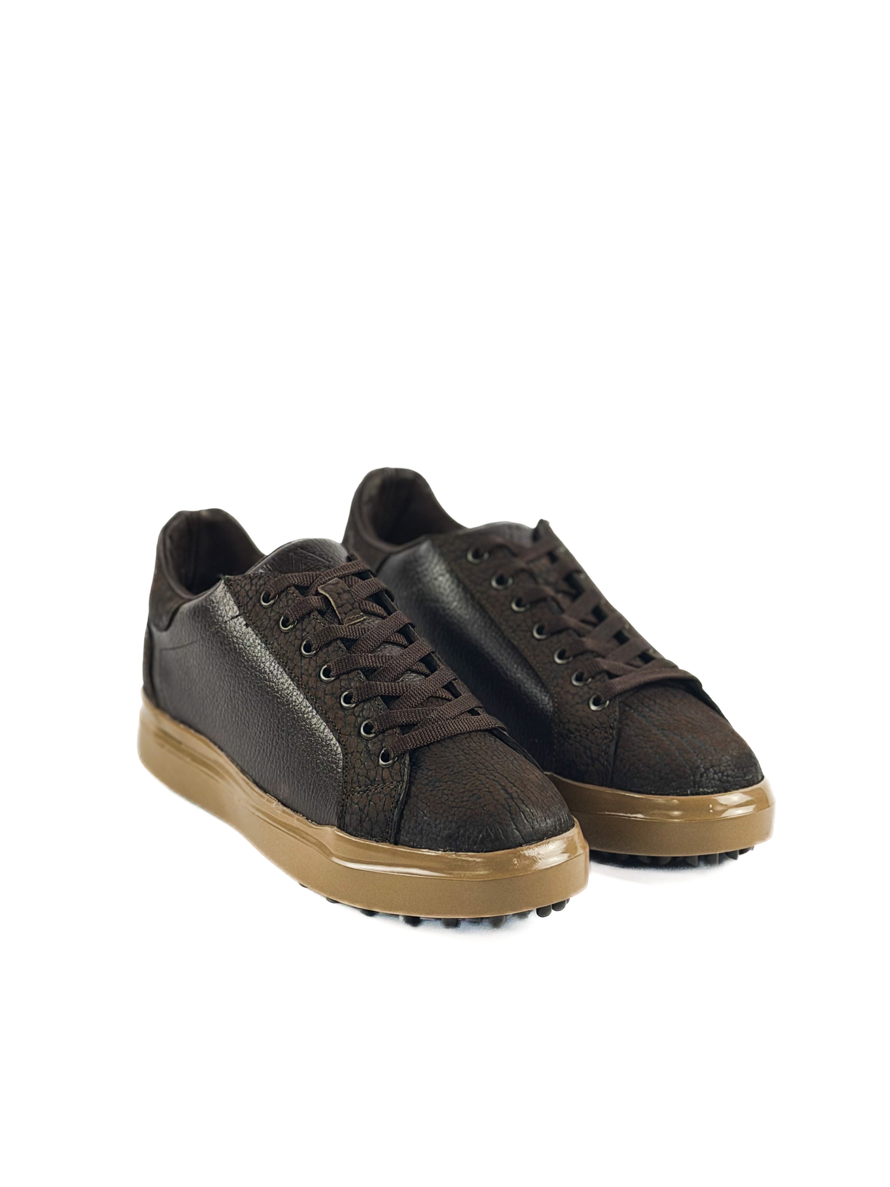 Pair of brown bulls neck laced sneakers with tan soles and durable traction
