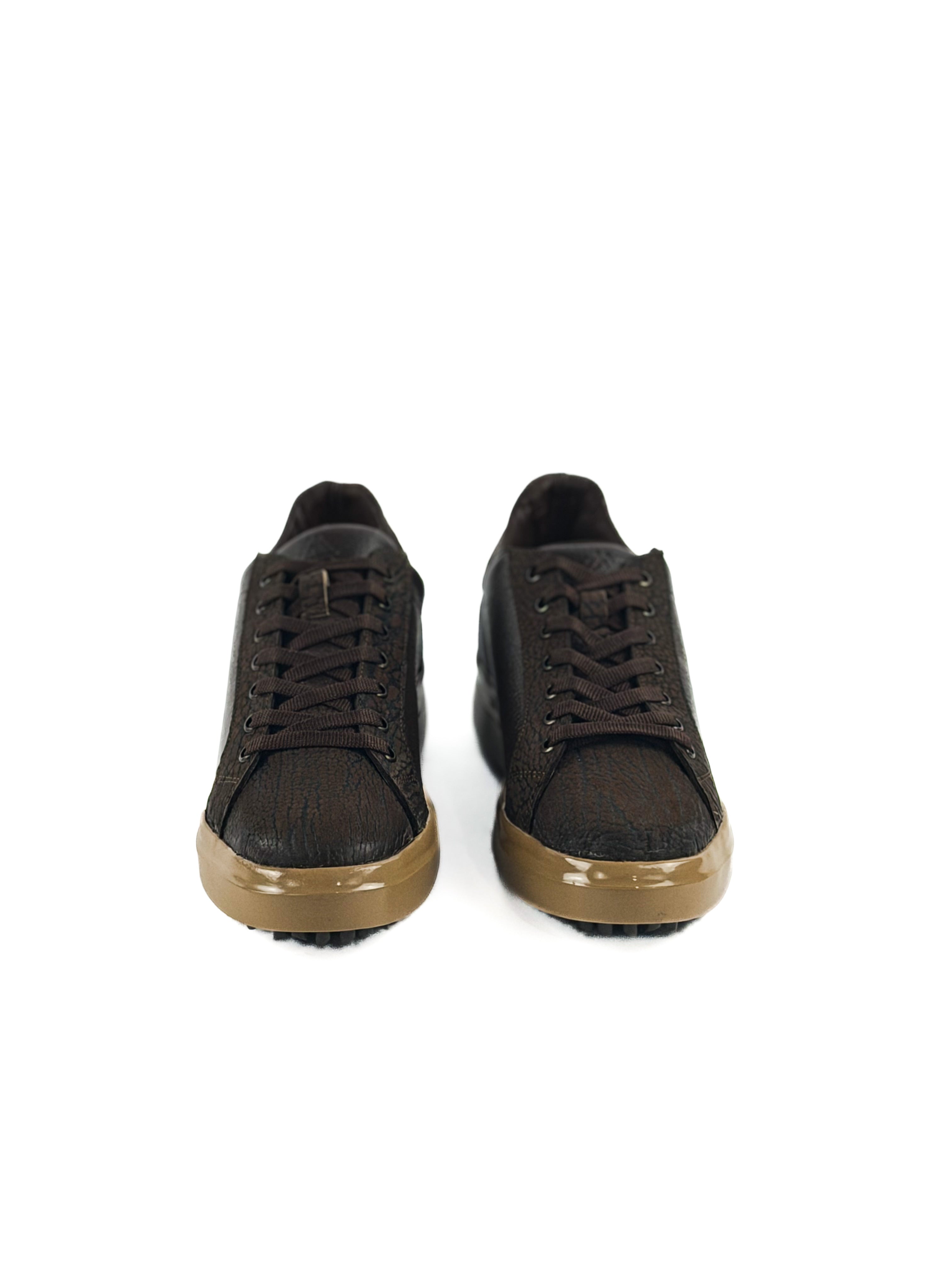 Pair of brown bulls neck laced sneakers with tan soles and durable traction