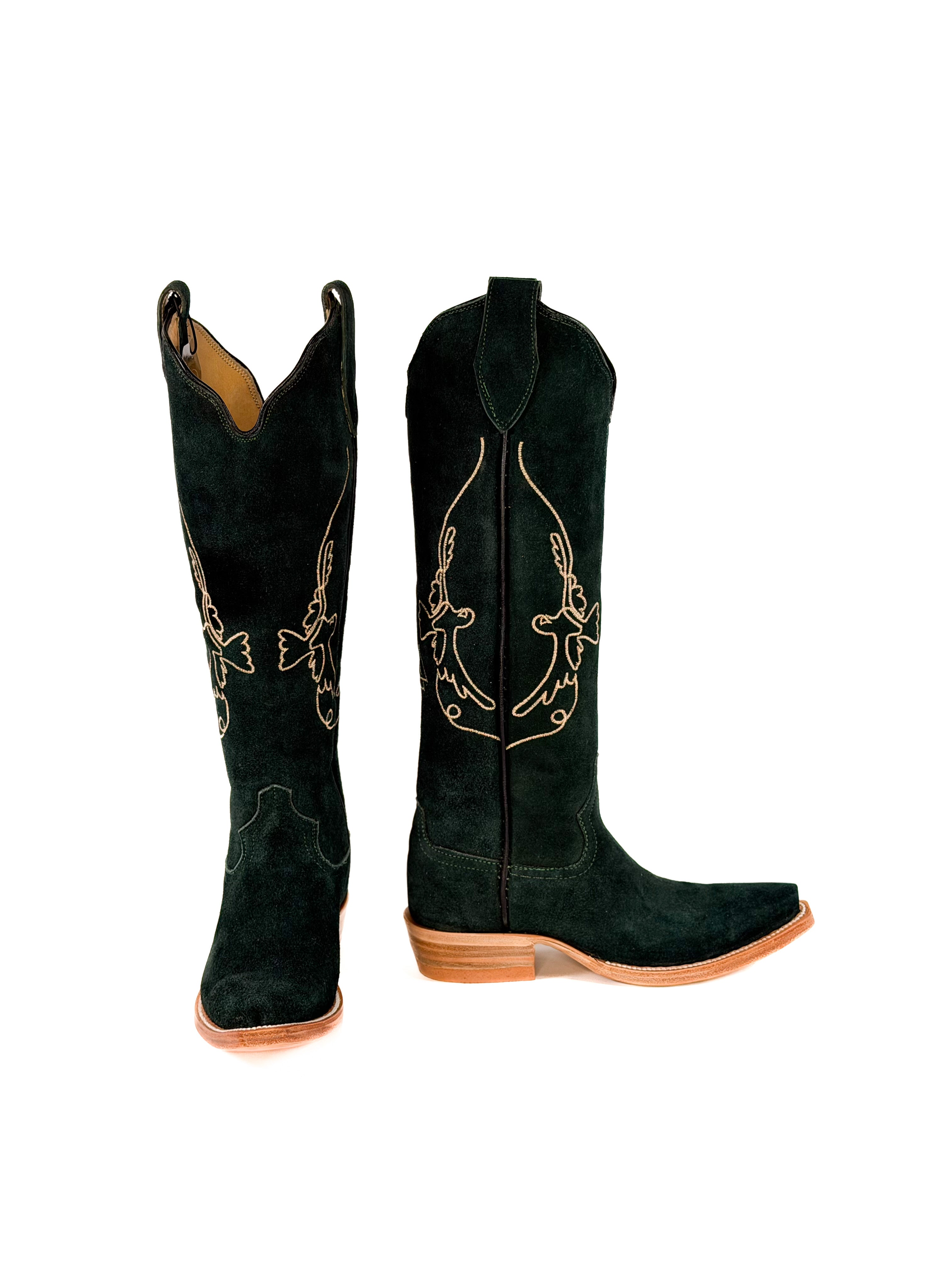 pair of green suede cowgirl boots with gold bird detailing