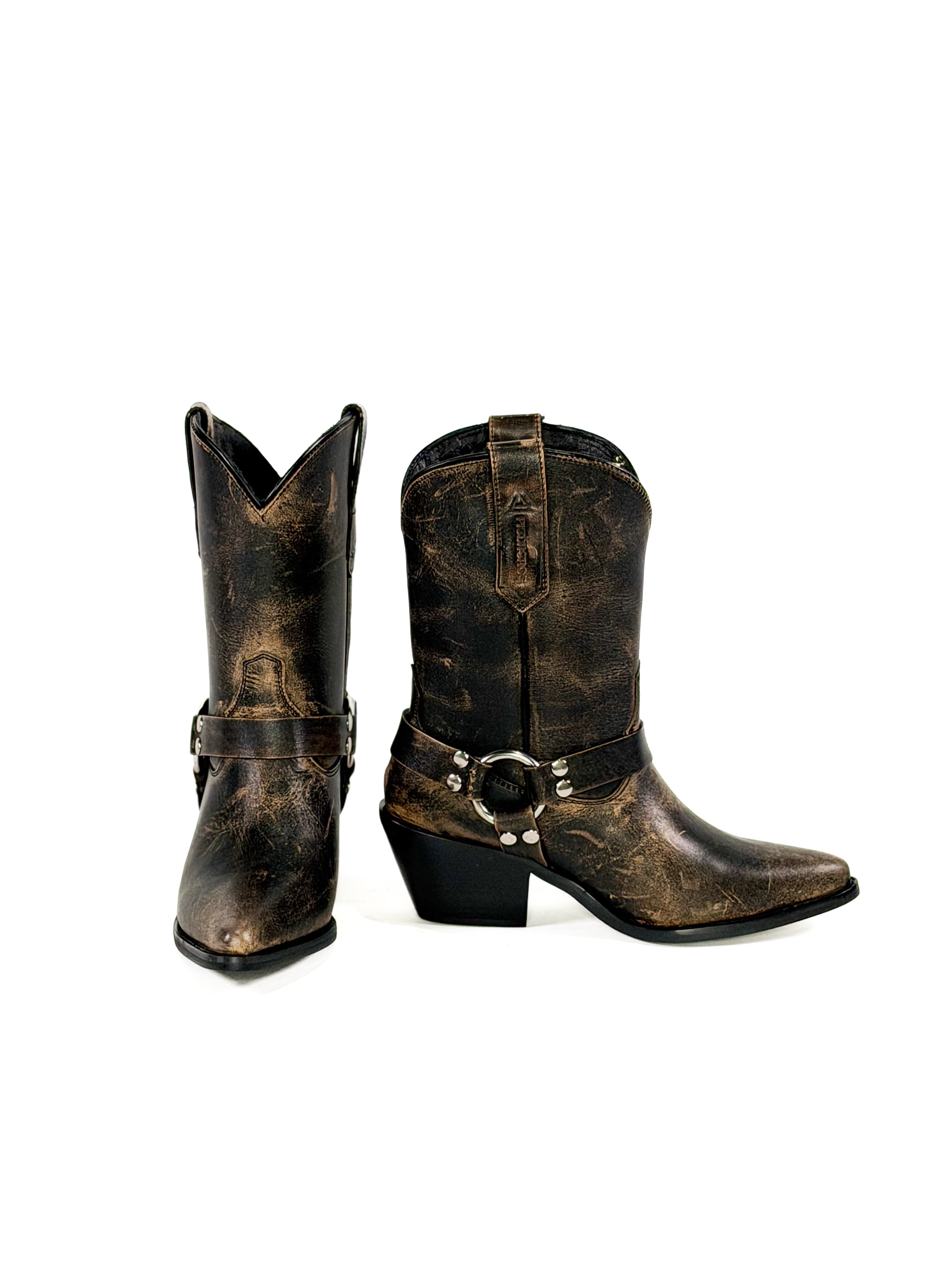 Piedreros brown leather cowboy boots with metal buckles on a white background