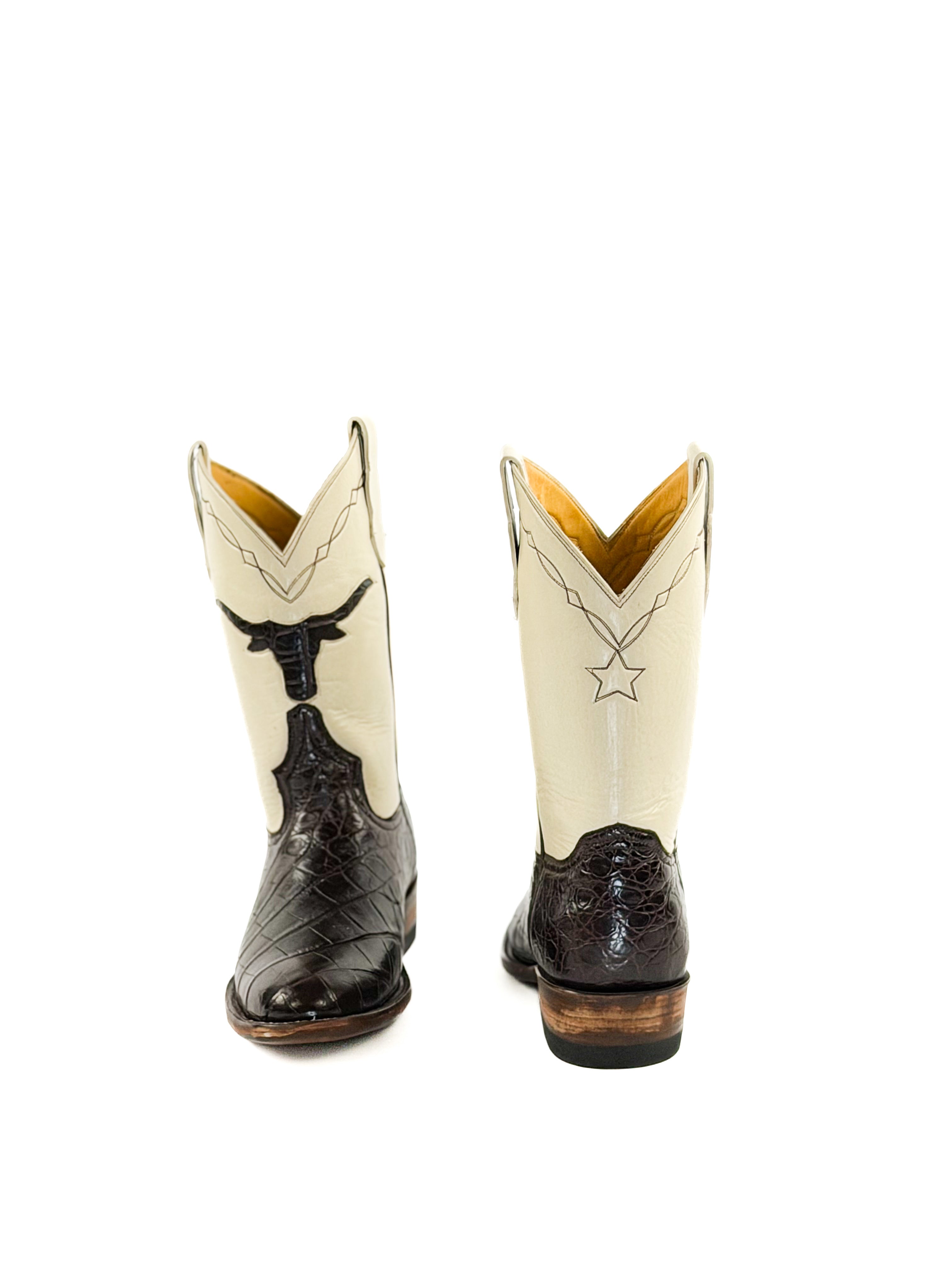 Pair of cherry brown round toe American alligator boots with cream upper shaft and longhorn logo