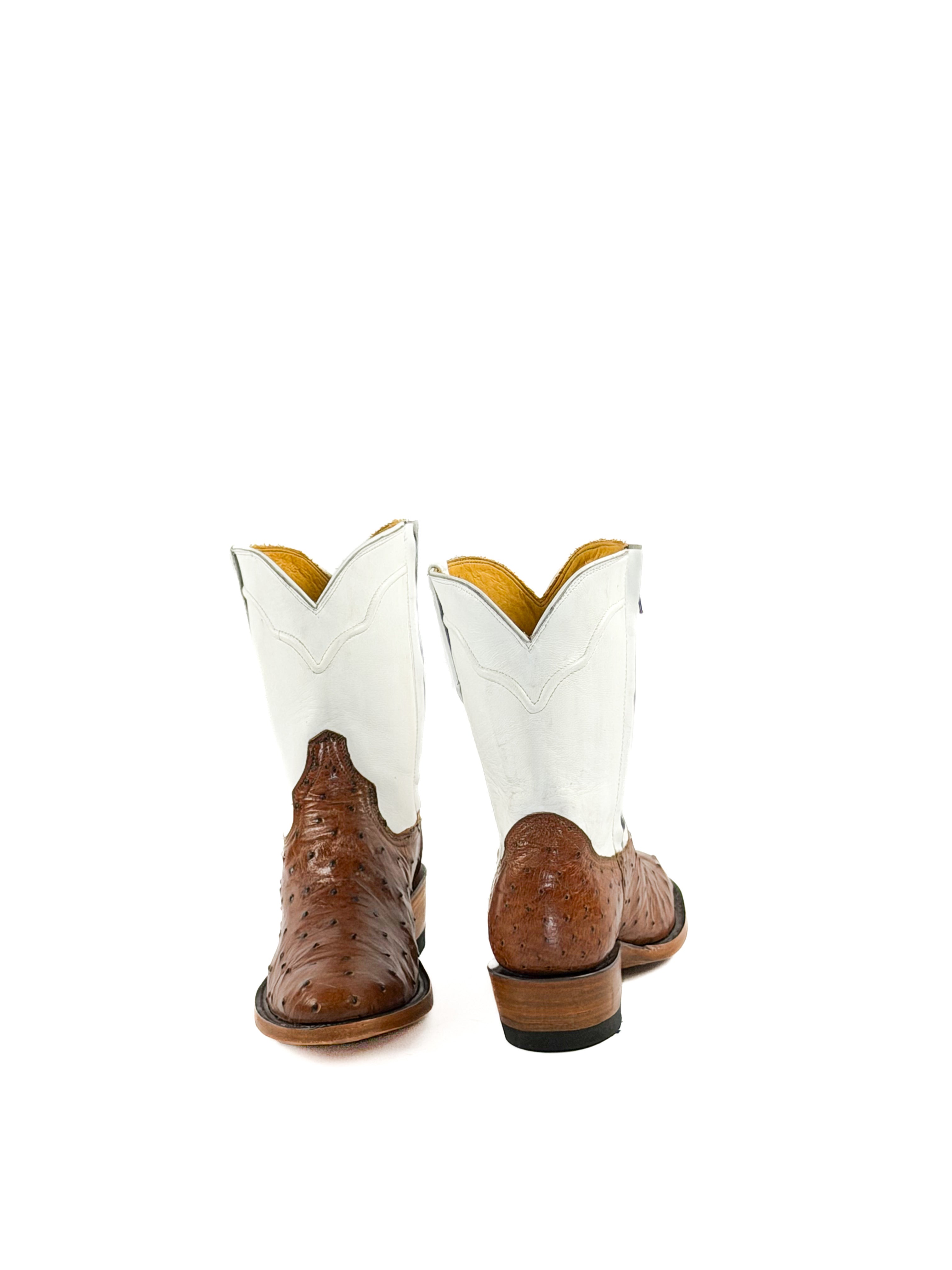 Brown round toe ostrich boots with a white upper shaft