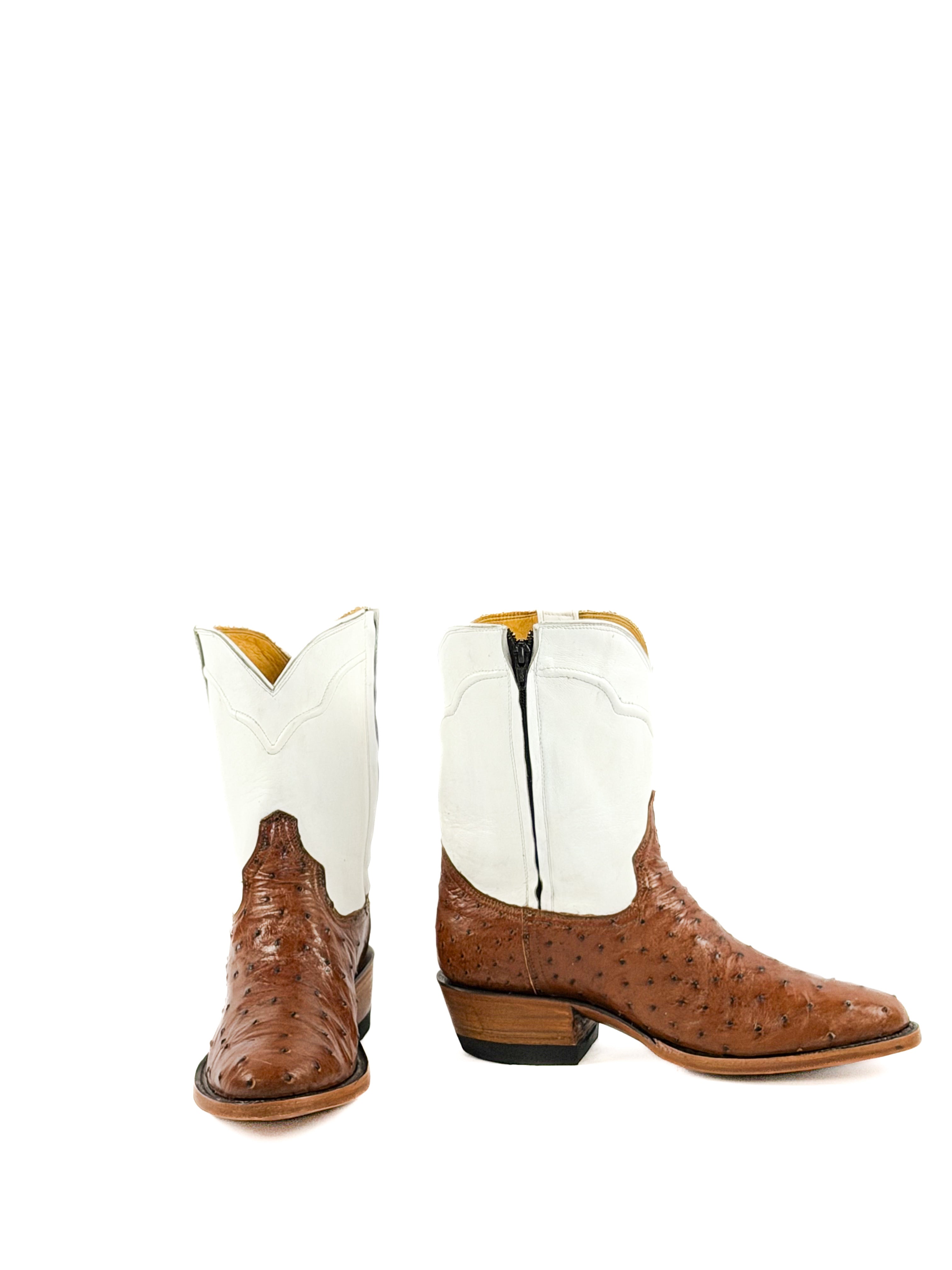 Brown round toe ostrich boots with a white upper shaft