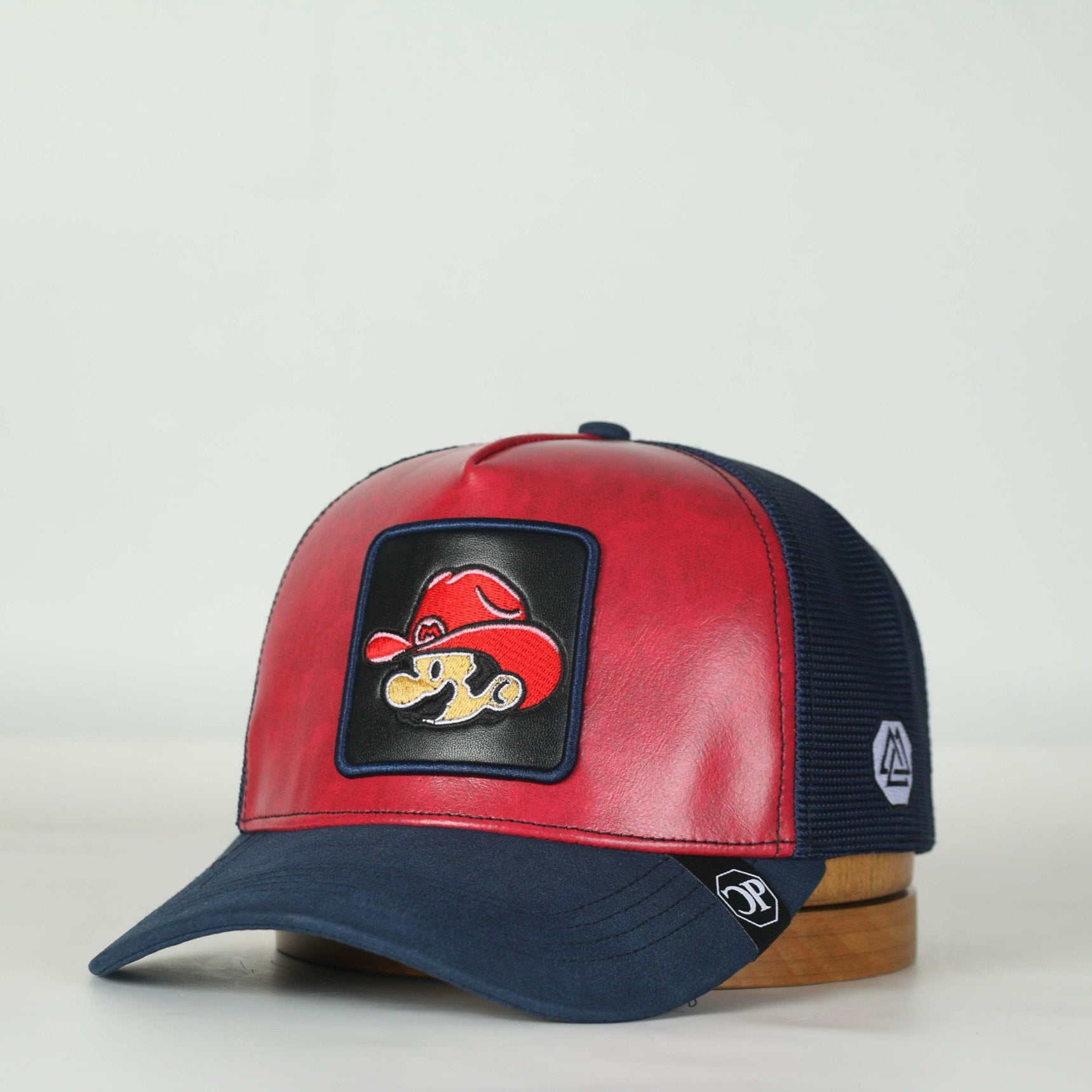 Leather Caps — side view of Cuadra Piedreros cap