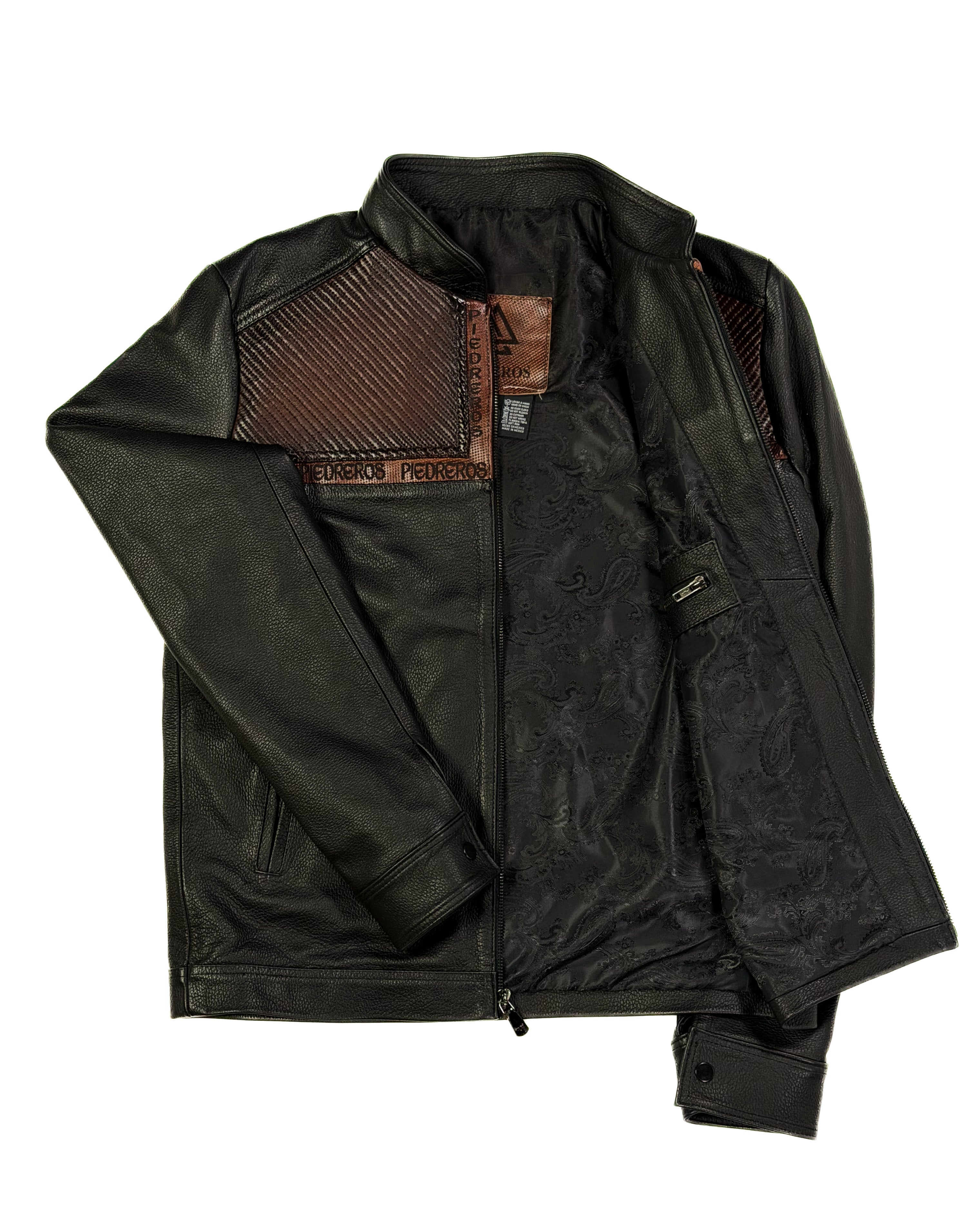 Interior of Black jacket with brown leather detailing and Piedreros logo