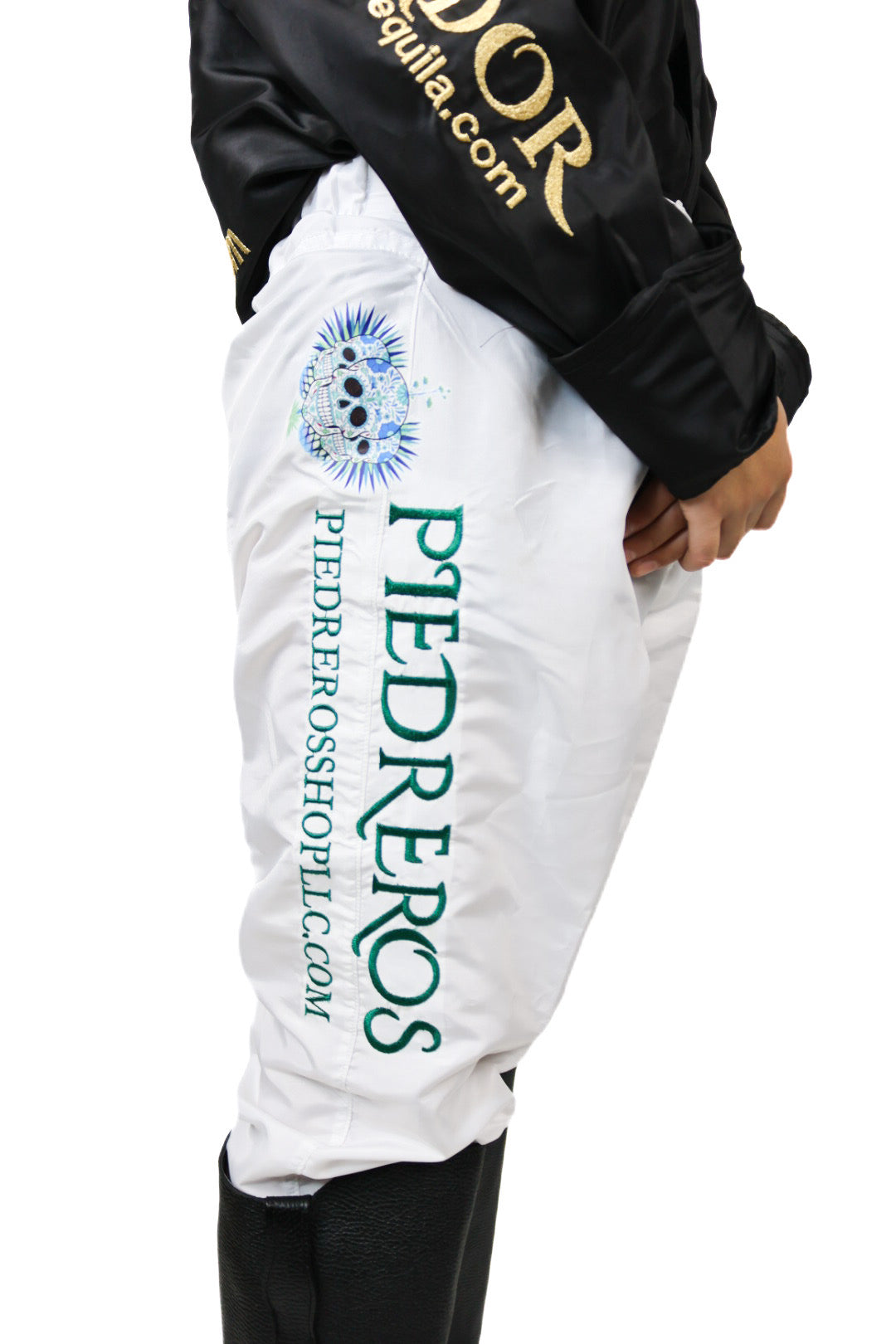 White pants with 'Pedreros'  triple skull blue logo