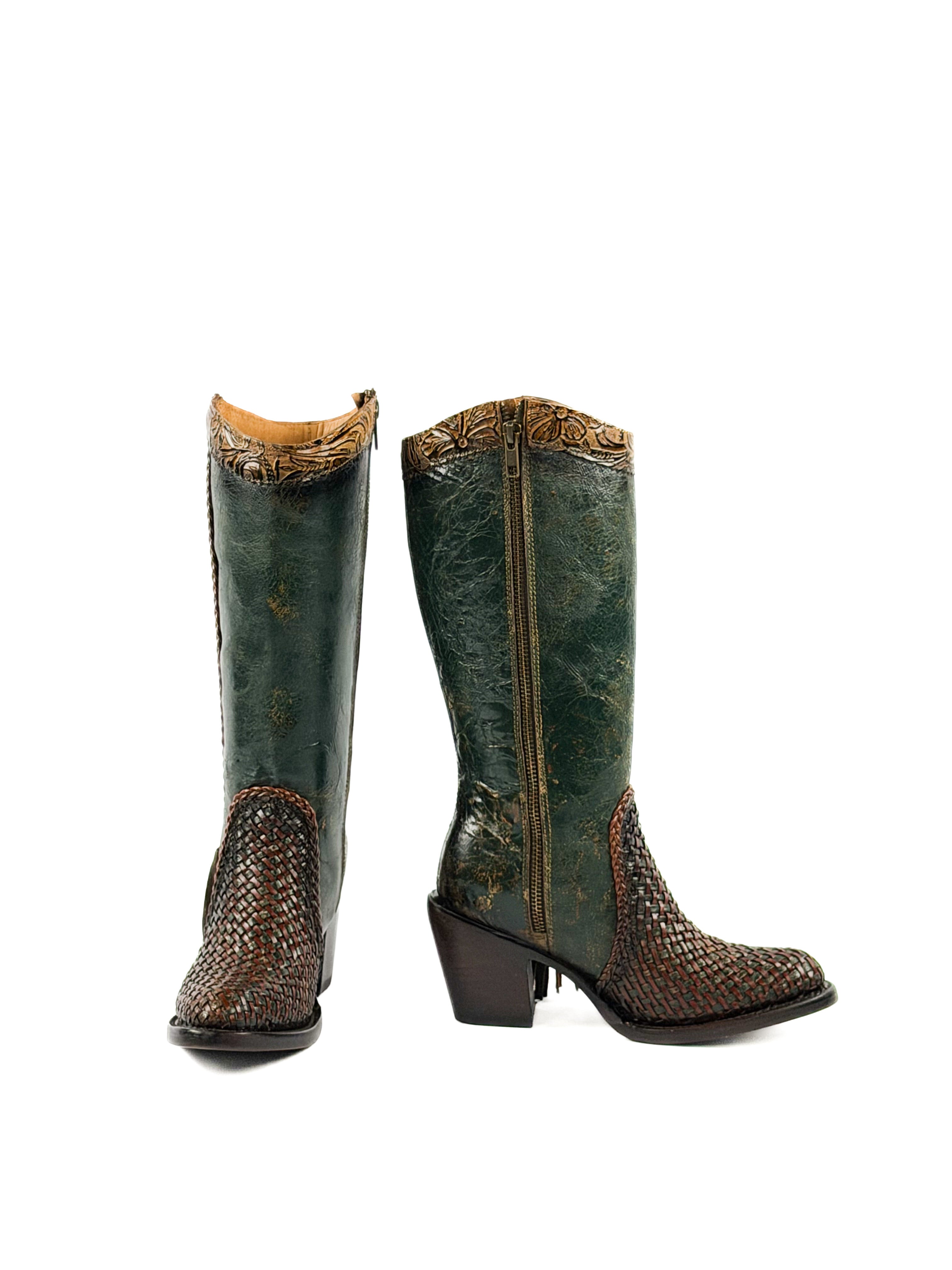 Pair of green leather boots with brown decorative elements and a 3 inch heel