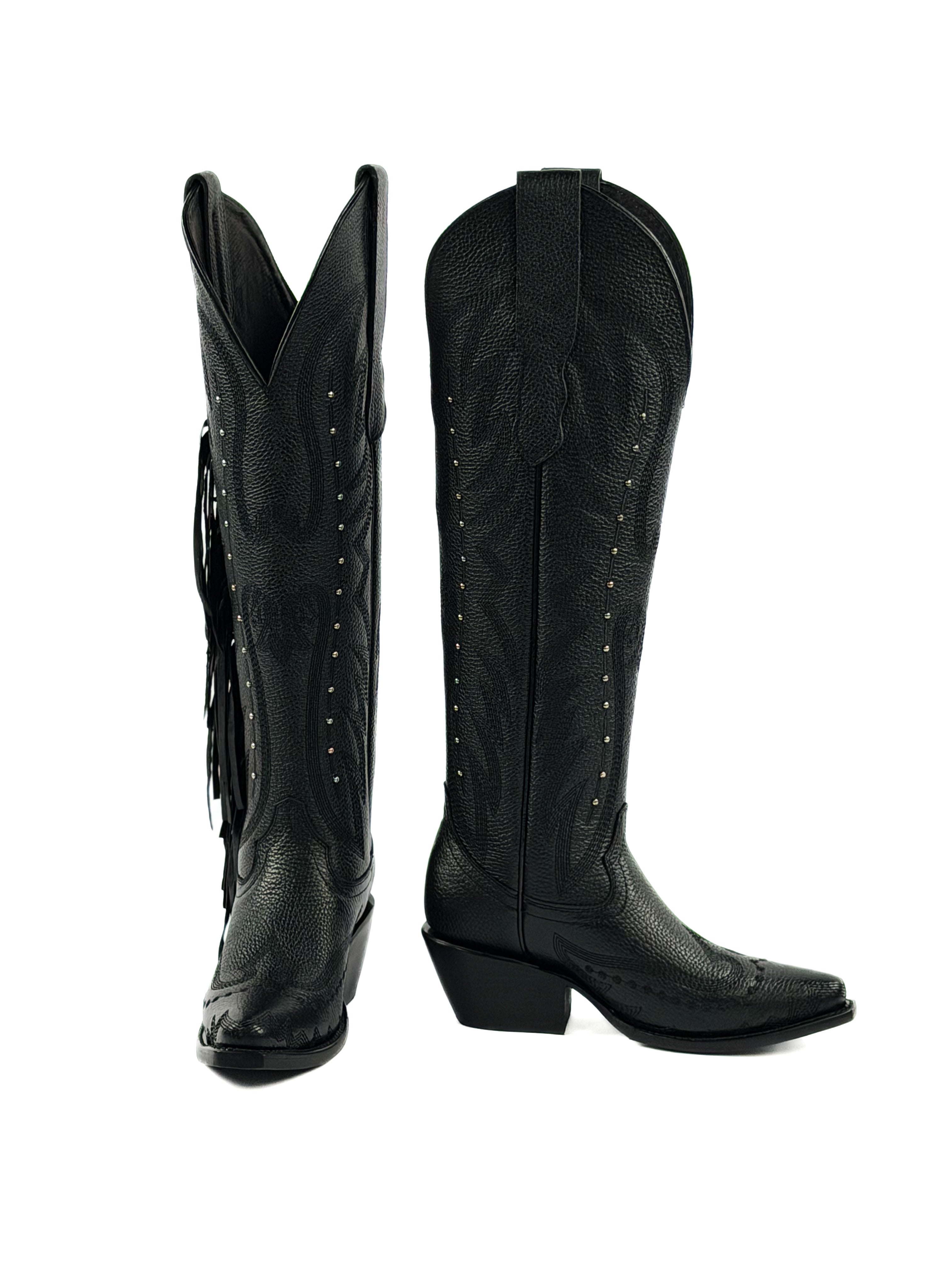 Pair of black snip toe cowgirl boots with fringes, silver studs, and 2 inch heel