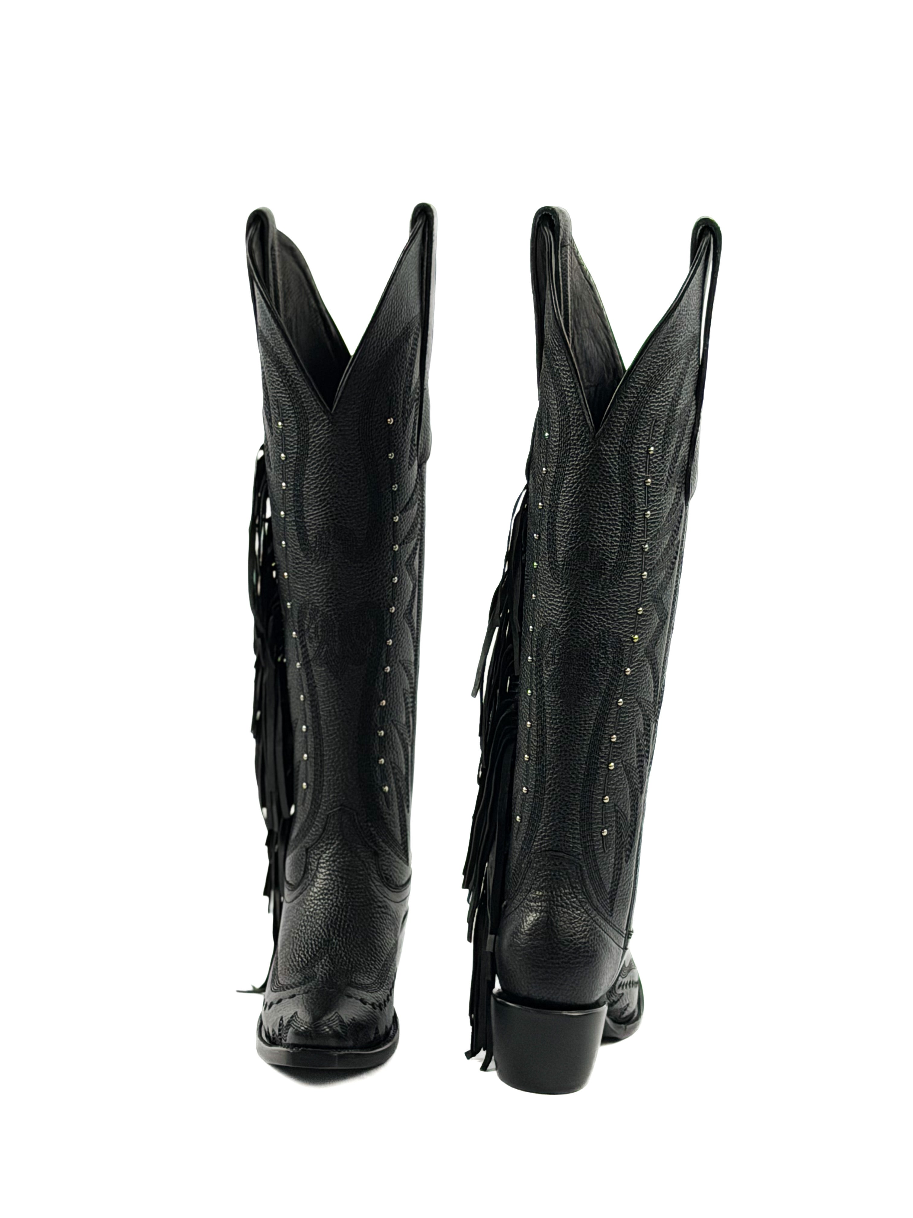Pair of black snip toe cowgirl boots with fringes, silver studs, and 2 inch heel