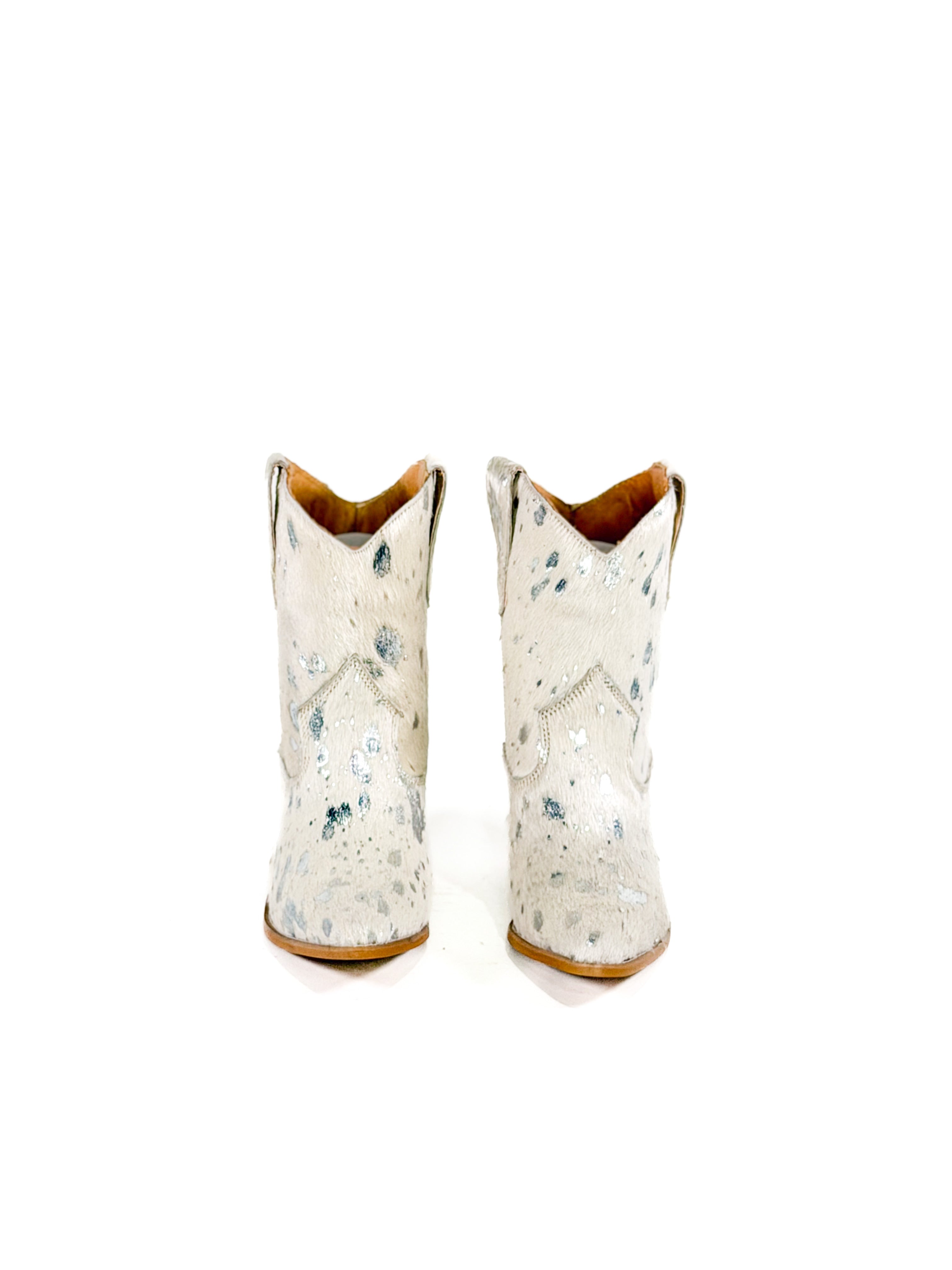 White speck cowhide studded ankle booties