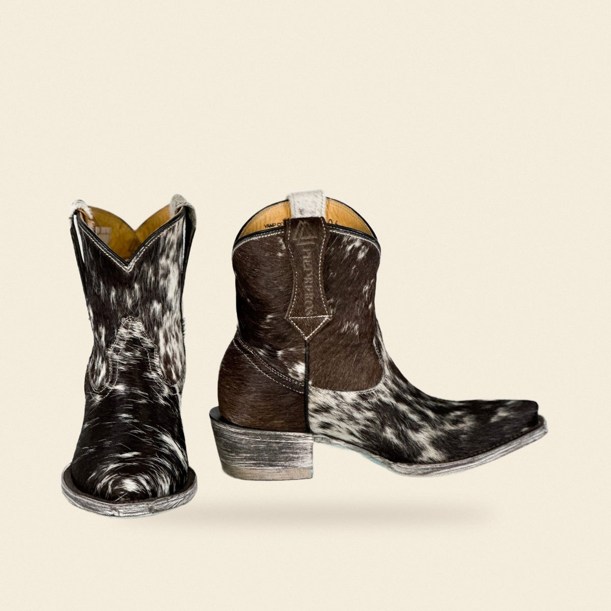 The Liliana — Cowhide Women's Cowboy Boot, front and side view